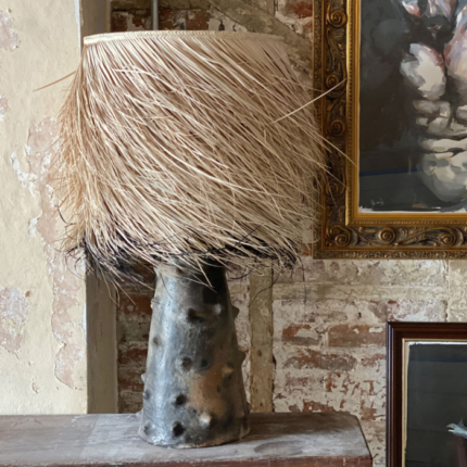 superb handcrafted lamp in morocco from clay with a dark matt paint finish and styled with a spectacular 40cm domed palm fiber light shade.