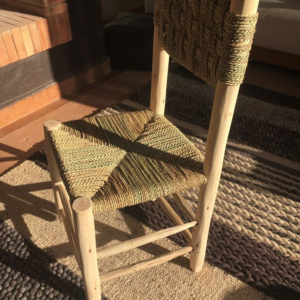 DOUM CHAIR Traditional eucalyptus wood chair with upholstered seat in doum or tressed palmier leaves.Hauteur standard assise 45 cm.