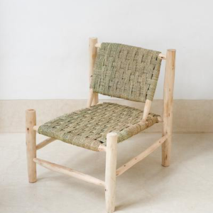 WICKER CHAIR UNIQUE . handcrafted from local rattan,this comfy chair will add a touch of elegance to your house. Dimensions: 76cm x 68cm x 60cm
